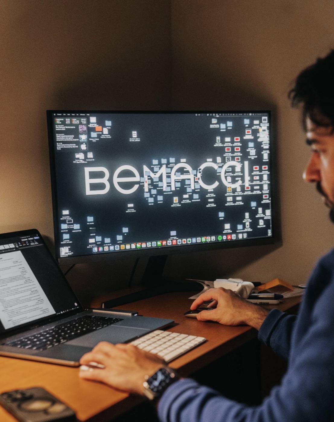 Berke Kızılcan at work, the BEMACCI logo on screen
